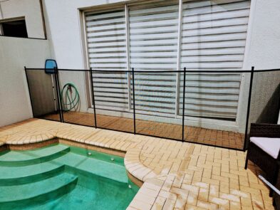 a pool next to a building