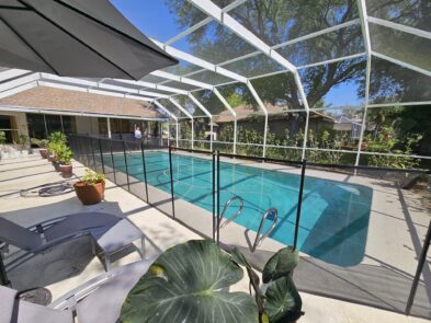 a swimming pool with a glass roof
